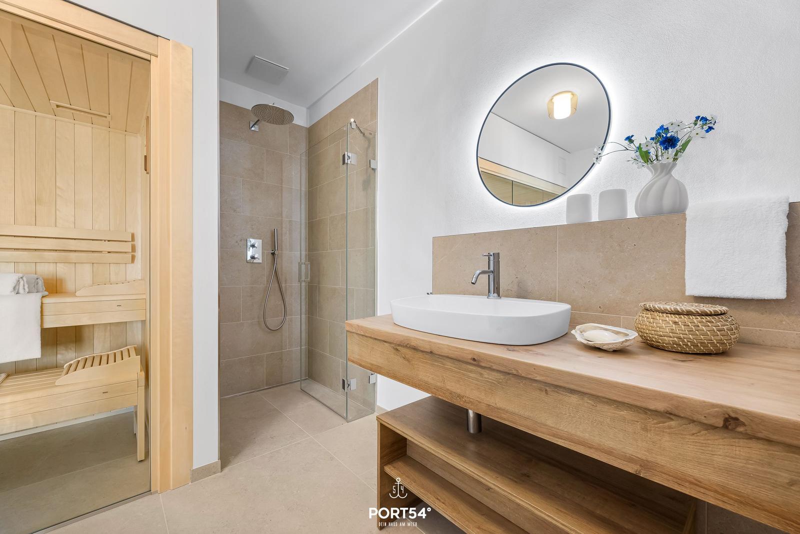 Bath with shower, sink, and sauna