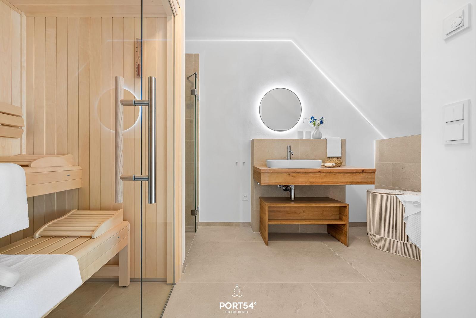 Bathroom with sauna, sink and shower