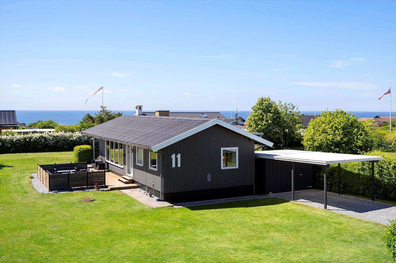 Modern house with terrace and garden, sea view.