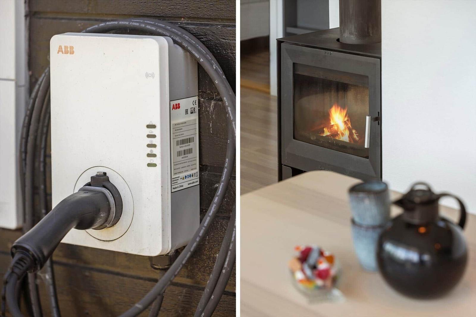 EV charging station and wood-burning stove with lit fire.