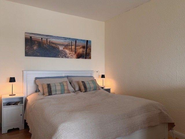 offener Schlafbereich im Wohnzimmer