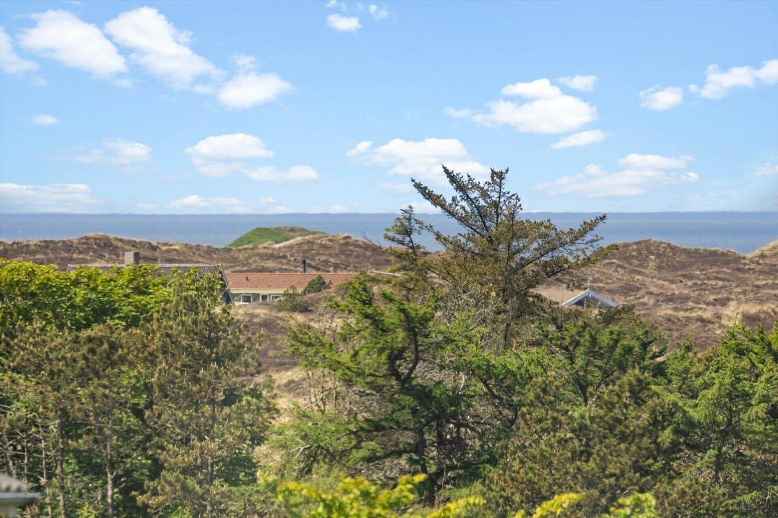 Haus mit Blick auf das Meer und Dünen