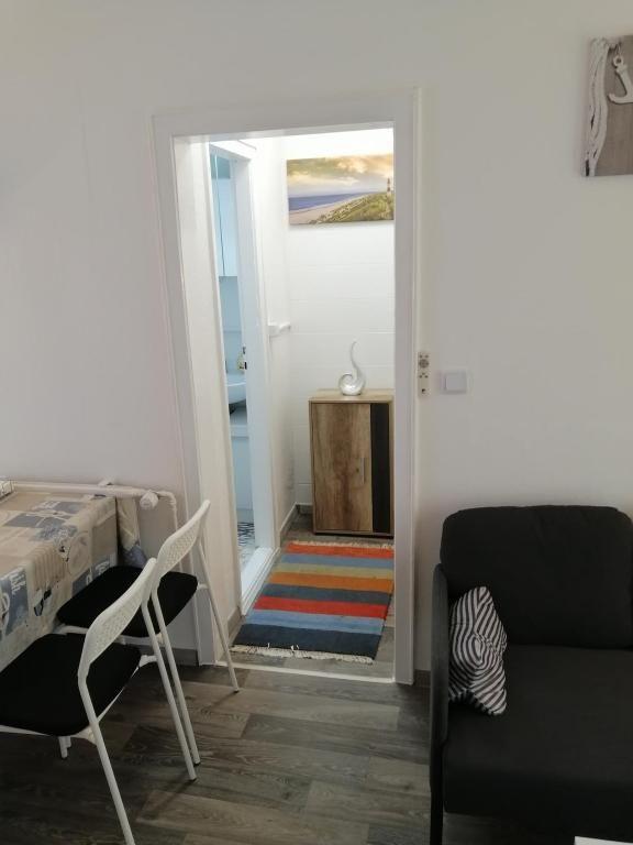 FEWO Kliff Watt Nr. 4, Hamburgerstr. 30, 27476 Cuxhaven Sahlenburg, Wohnzimmer