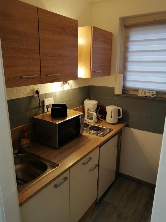 FEWO Kliff Watt Nr. 4, Hamburgerstr. 30, 27476 Cuxhaven Sahlenburg. Küche