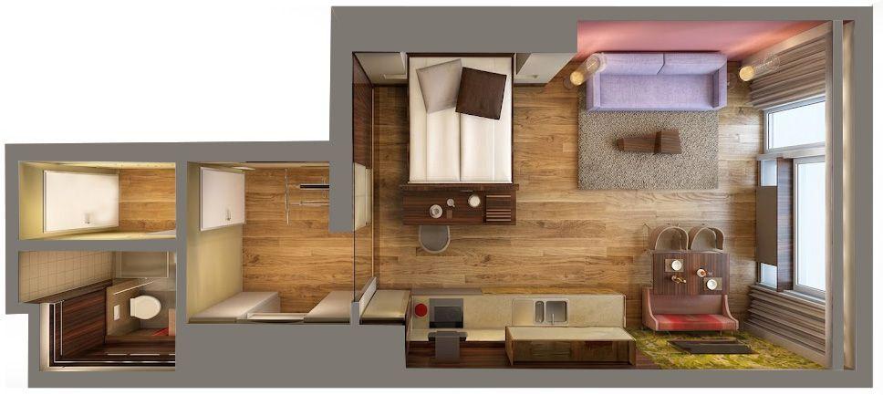 Schlafzimmer mit Bett, Wohnbereich mit Sofa und Küche. Dusche und Toilette sind vorhanden.