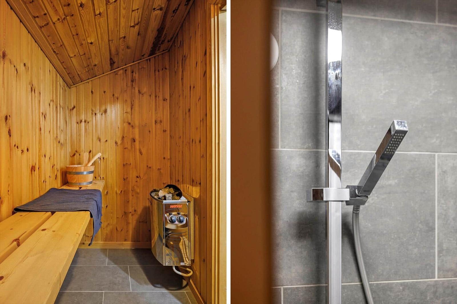 Sauna mit Holzwand und Dampfgenerator. Dusche mit Glaswand und modernem Duschkopf.
