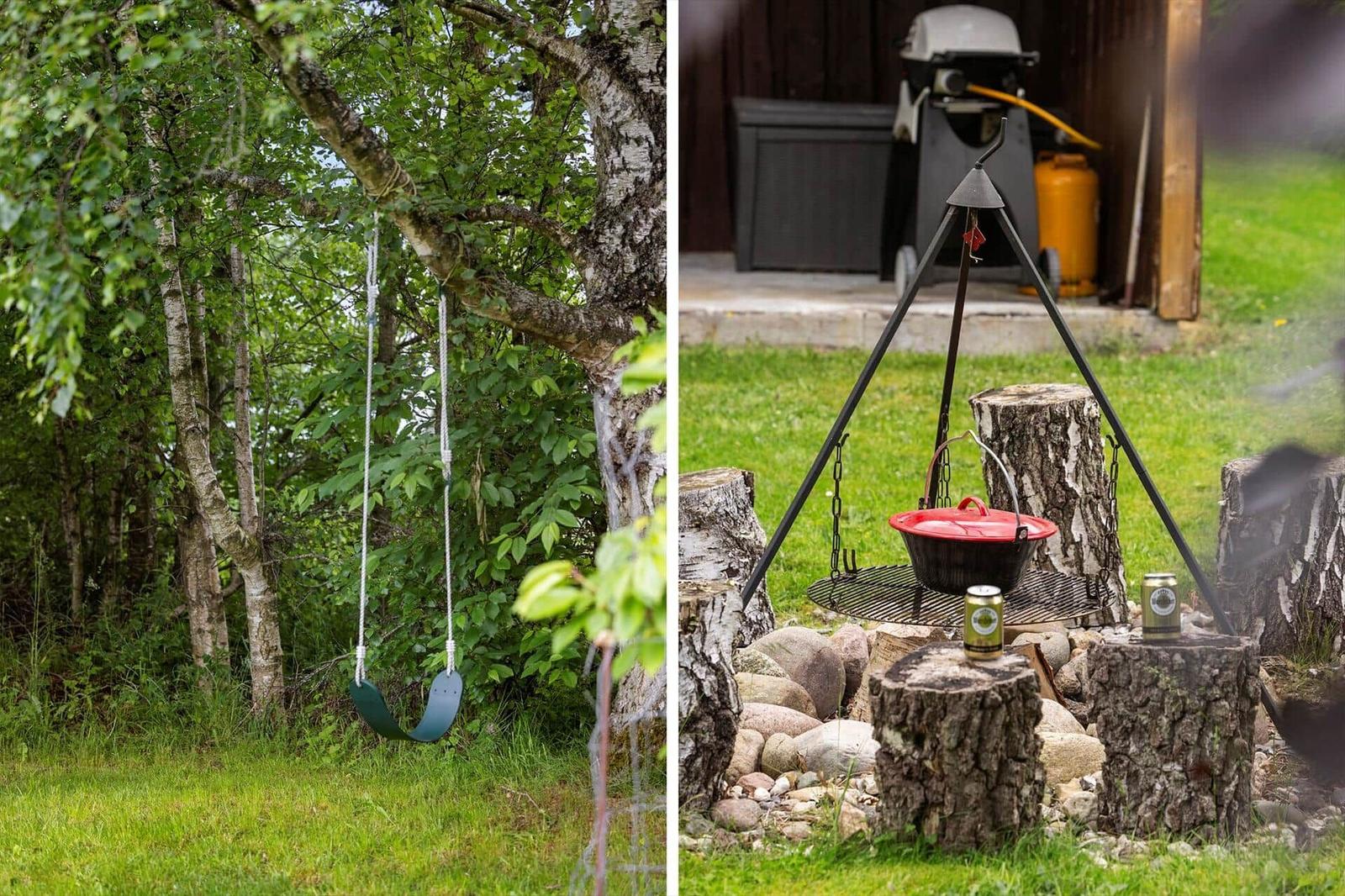 Schaukeln unter Bäumen und Grillplatz mit Kochtopf und Bierdosen.