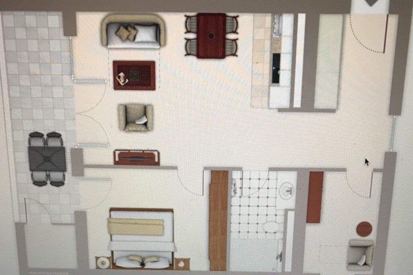 Dieses Haus hat zwei Schlafzimmer, eine Küche, ein Bad und eine Terrasse.