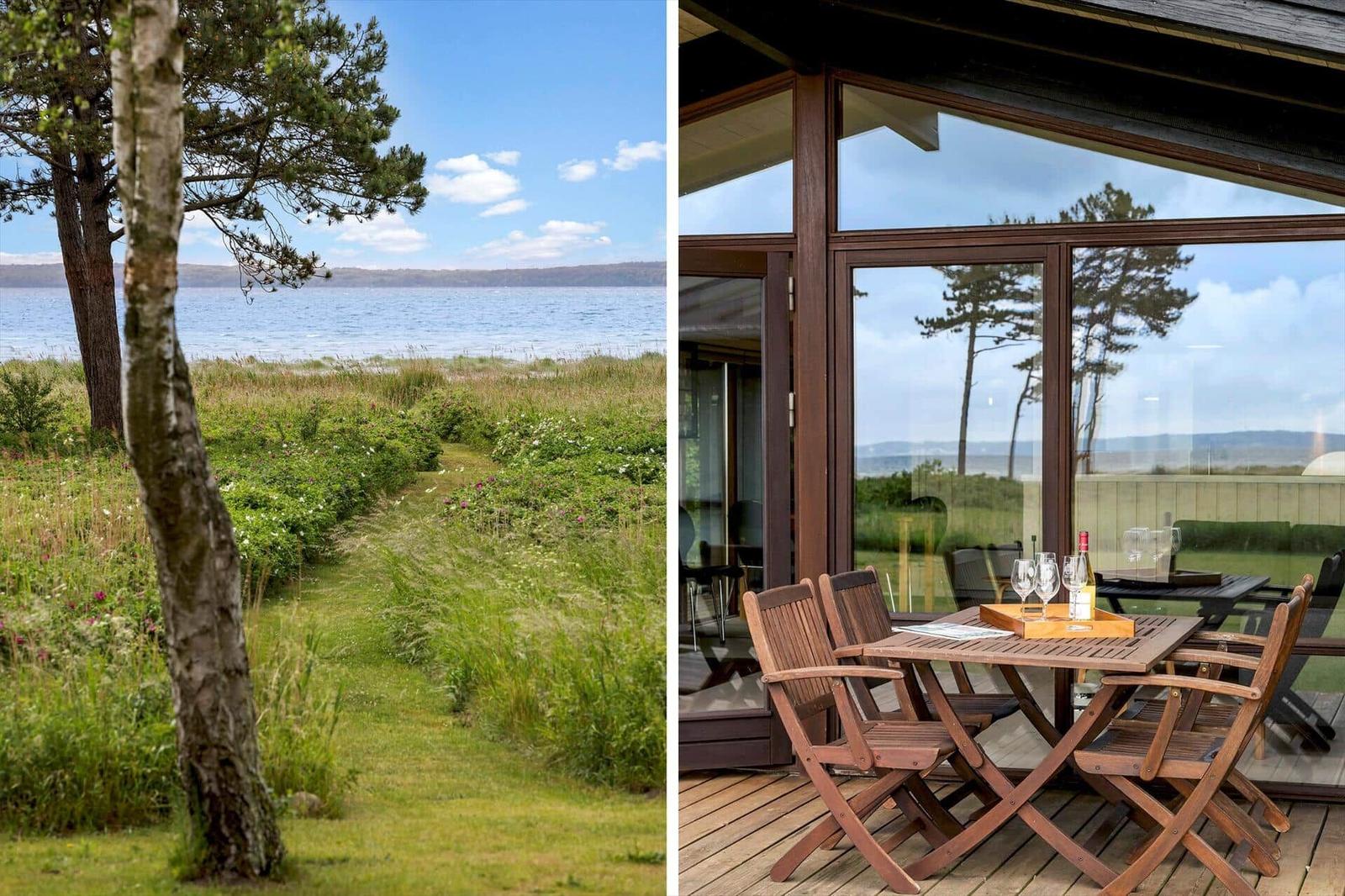 Cottage with sea view. Deck with table and chairs.