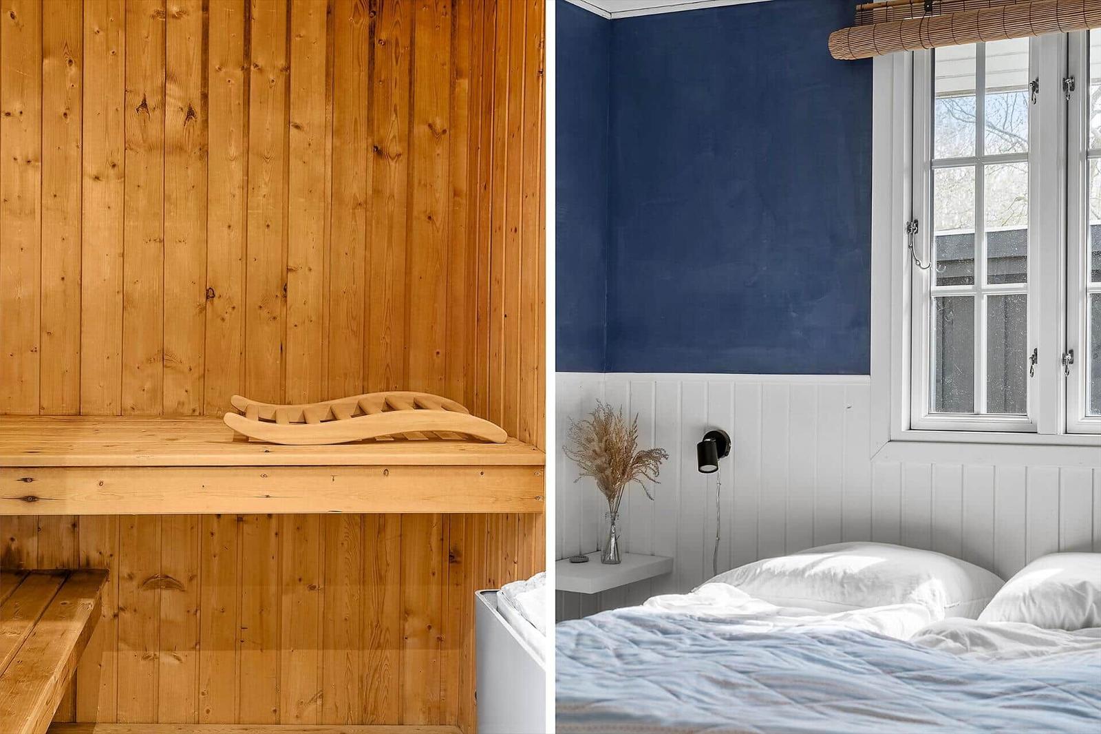 Sauna mit Holzwand und Bank. Schlafzimmer mit blauer Wand und Fenster.