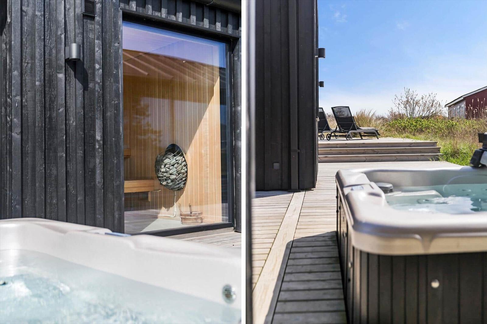 Sauna und Whirlpool auf der Terrasse mit Blick auf die Landschaft.