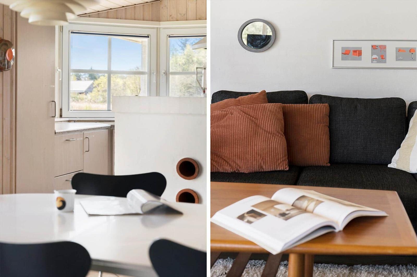 Küche mit Blick auf Außenbereich und Wohnzimmer mit Sofa und Couchtisch.