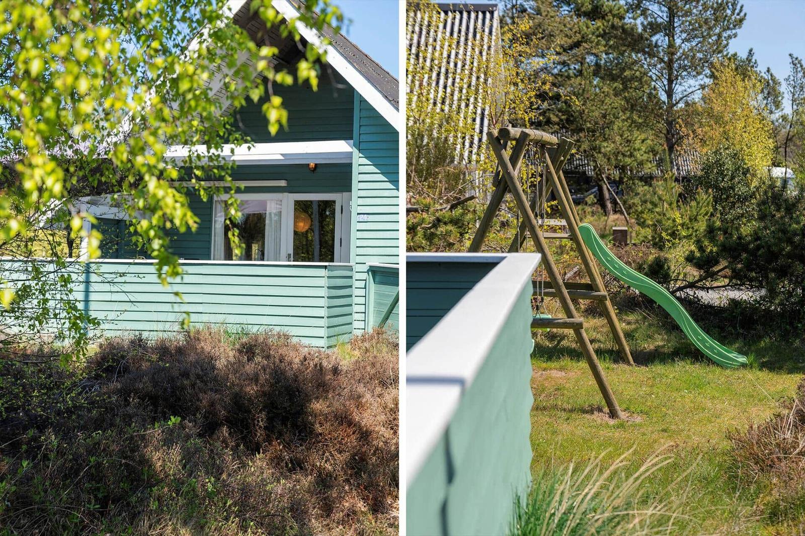 Grünes Haus mit Terrasse und Spielplatz mit Rutsche im Garten.