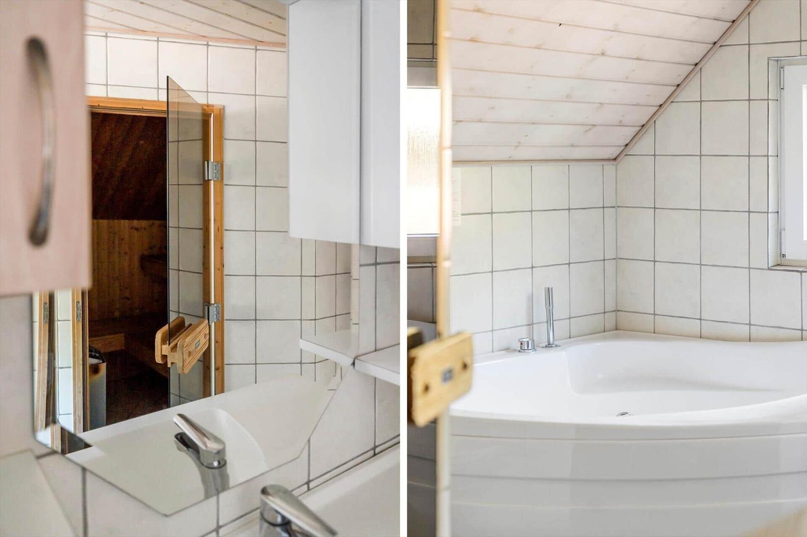 Badezimmer mit Dusche und Badewanne, Holzdecke und Fliesenwand.