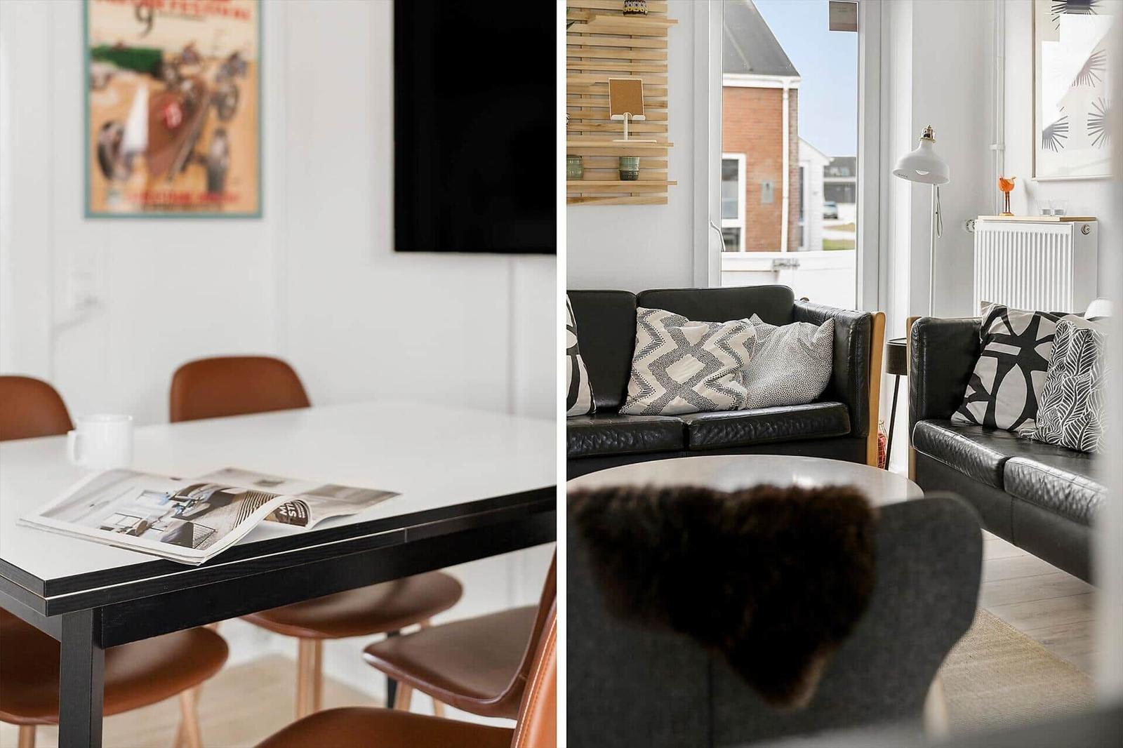 Essbereich mit Tisch und Stühlen. Wohnbereich mit Sofa und Couch.