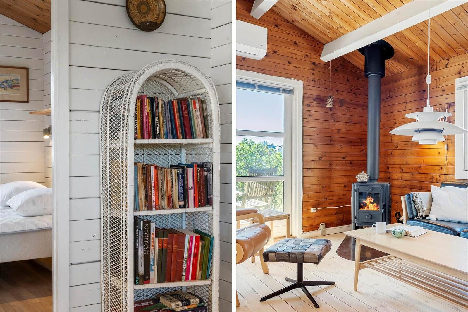 Schlafzimmer mit Bücherregal und Wohnzimmer mit Kamin und Fenster