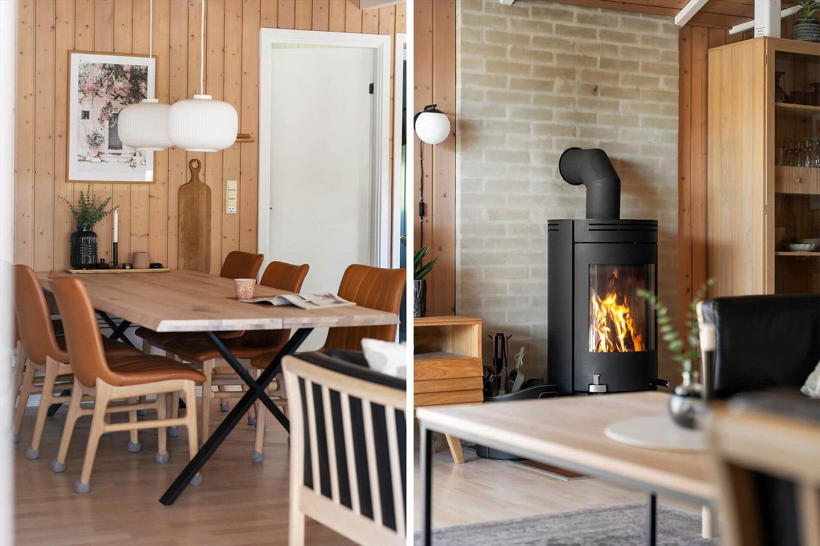 Essbereich mit Holzwand und Esstisch. Wohnzimmer mit Kamin und Holzmöbeln.