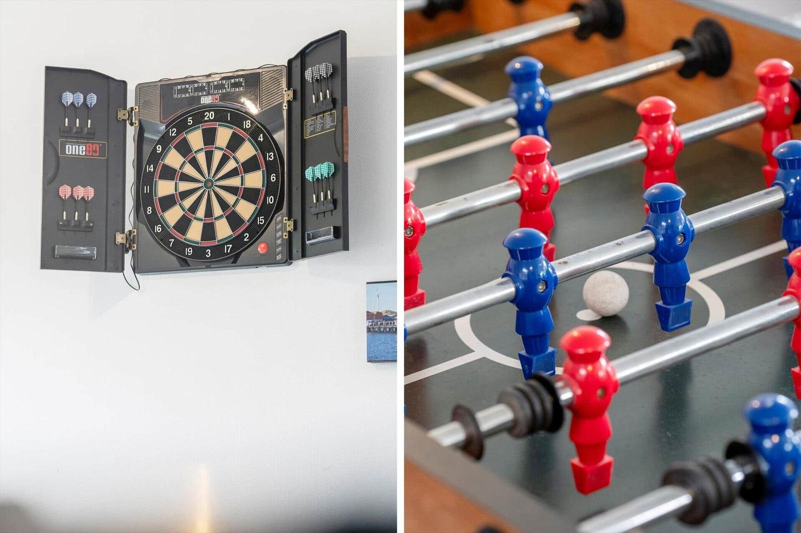 Dartscheibe und Tischfußball für Unterhaltung im Freizeitraum