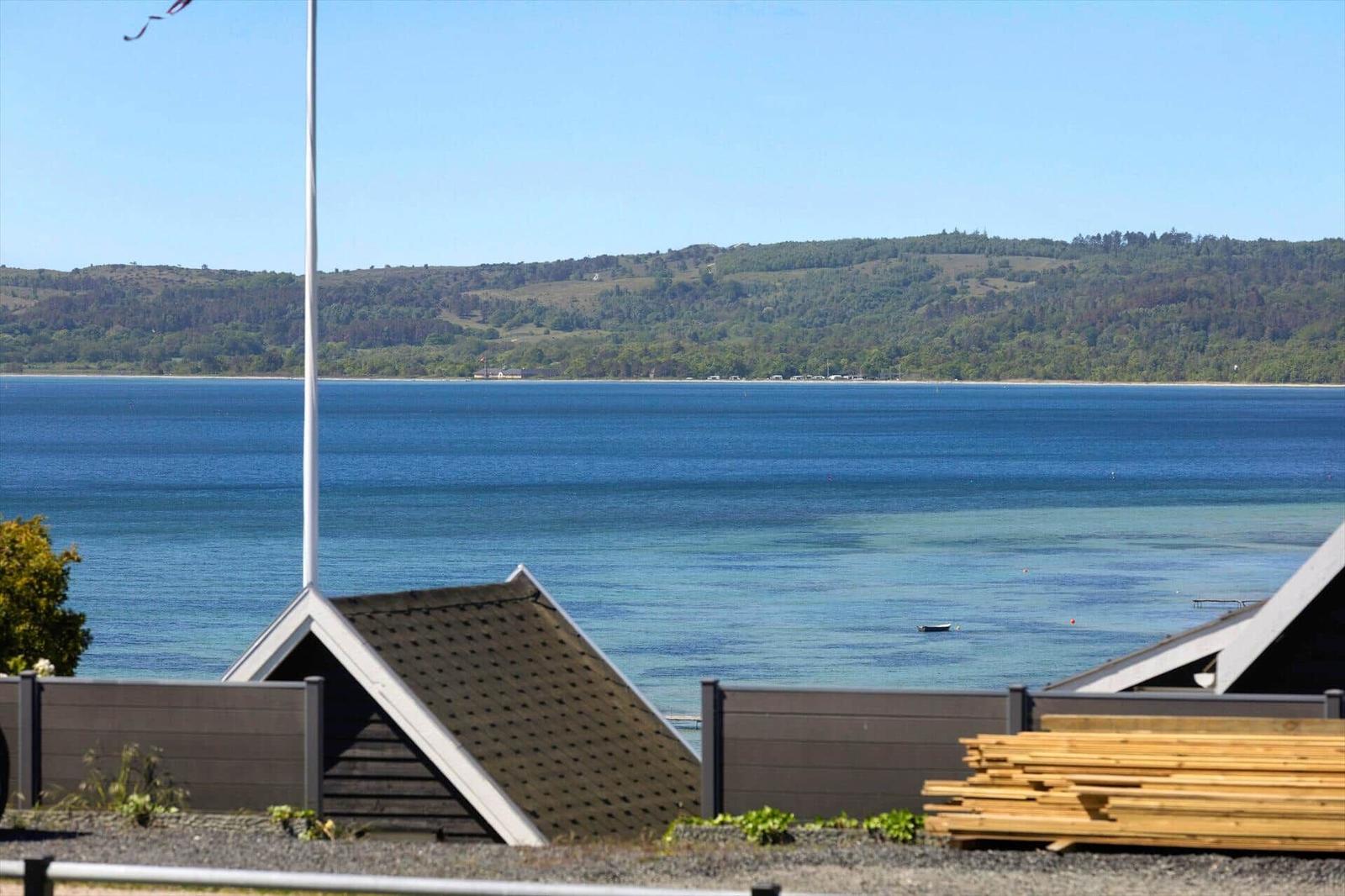 Sea view with forested hills and small boats