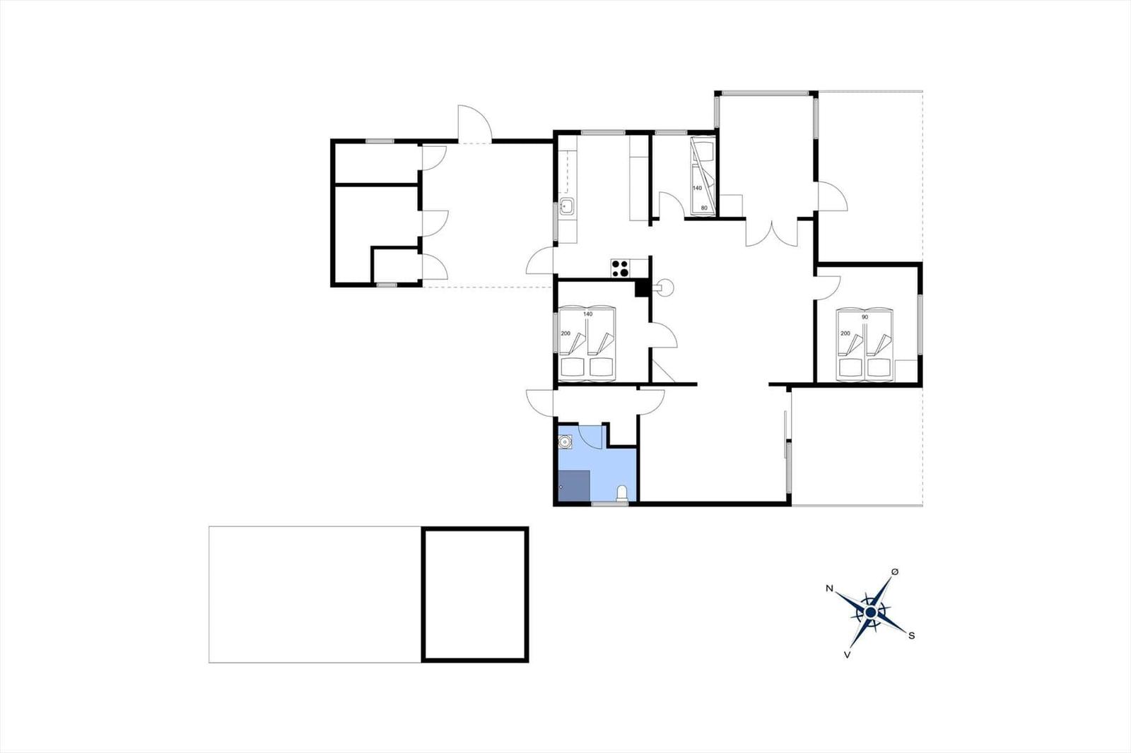 This is a floor plan of an apartment with multiple rooms and a bathroom.