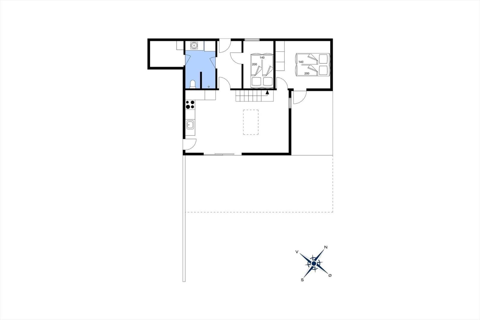 Ground floor plan with kitchen, bathroom, two bedrooms, and stairs to upper level.