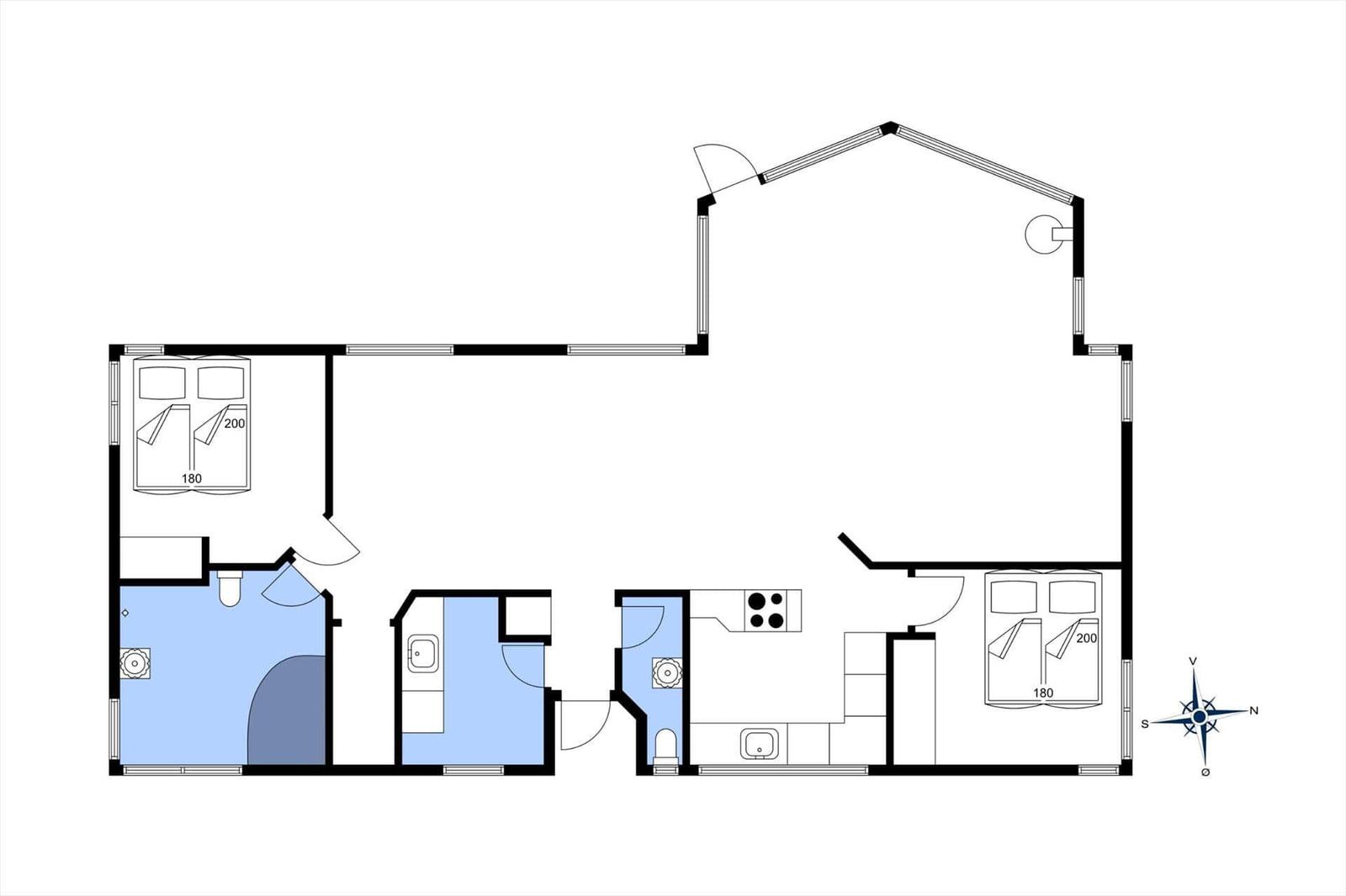 Two bedrooms, kitchen, bathroom, and living area with skylight.