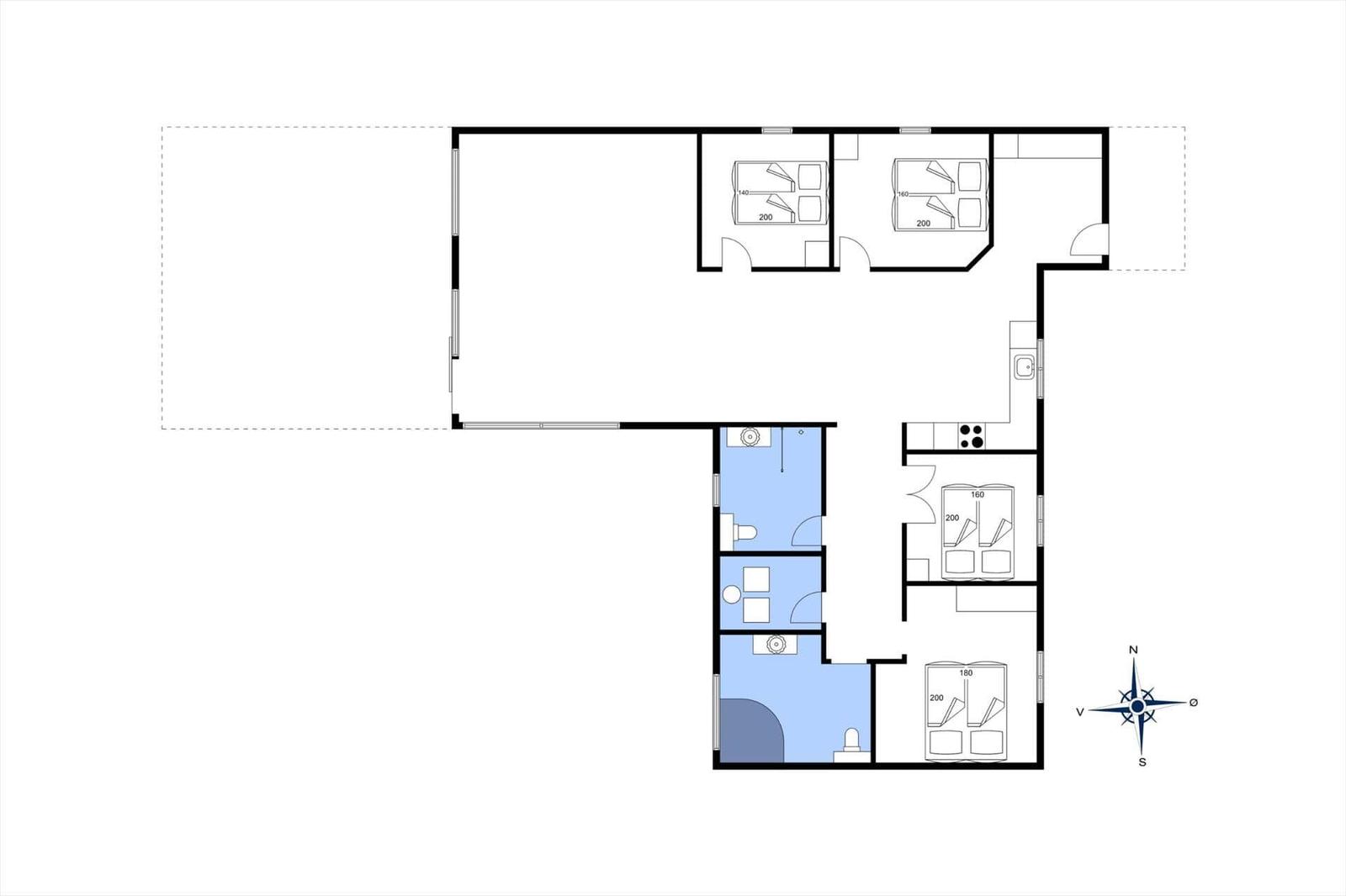Bedroom with bed, window, and mirror on the wall.