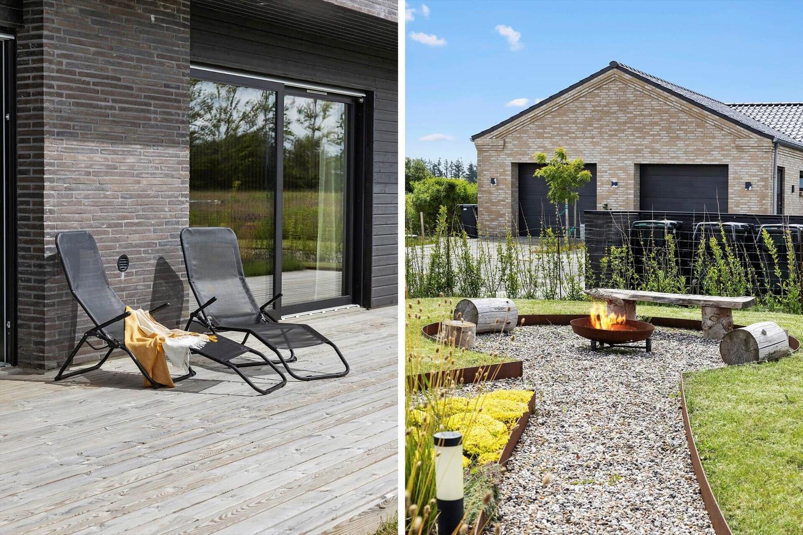Terrasse mit Liegestühlen und Blick auf Garten mit Feuerkorb und Holzbank.