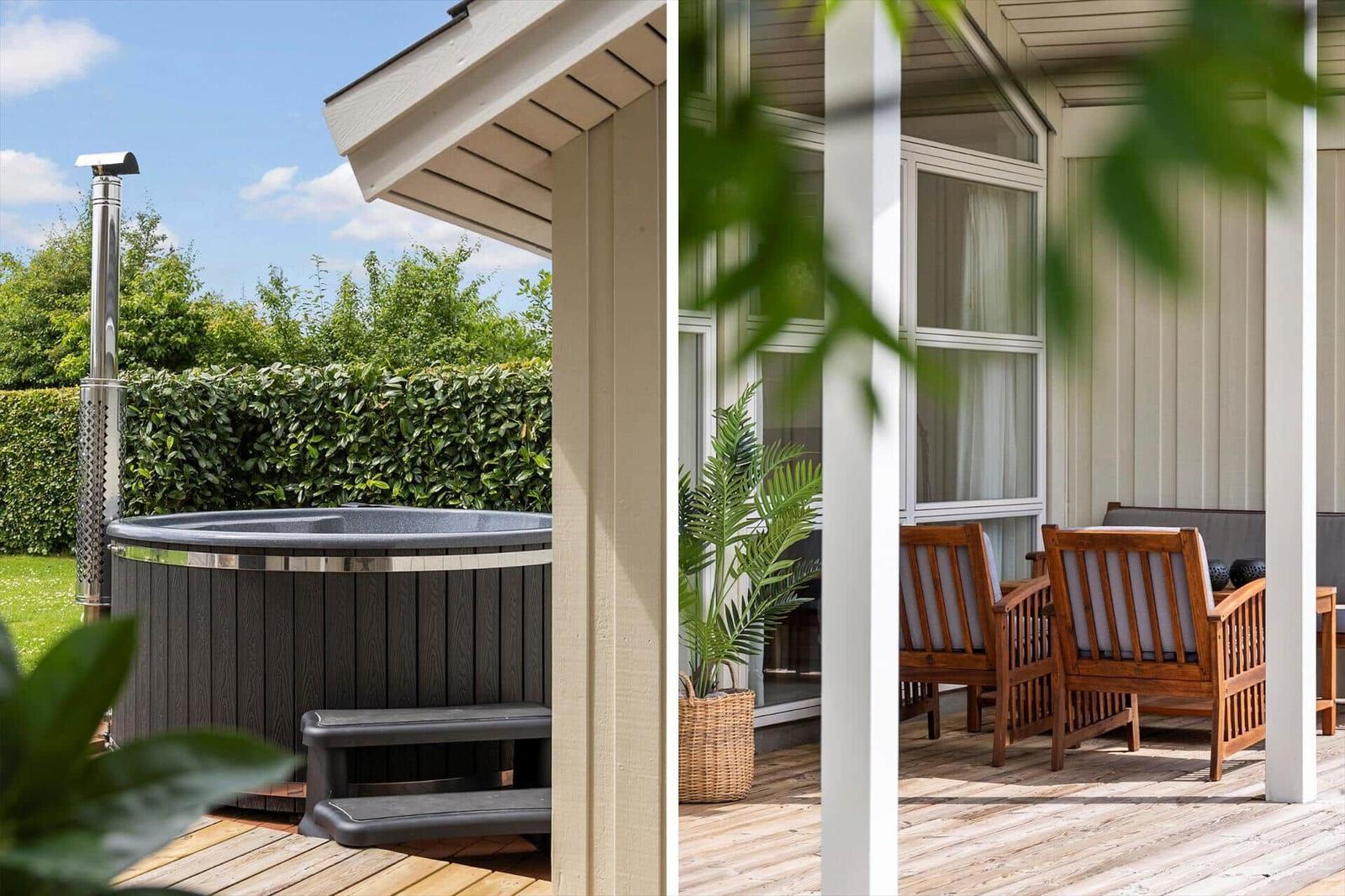 Outdoor area with hot tub and terrace with seating.