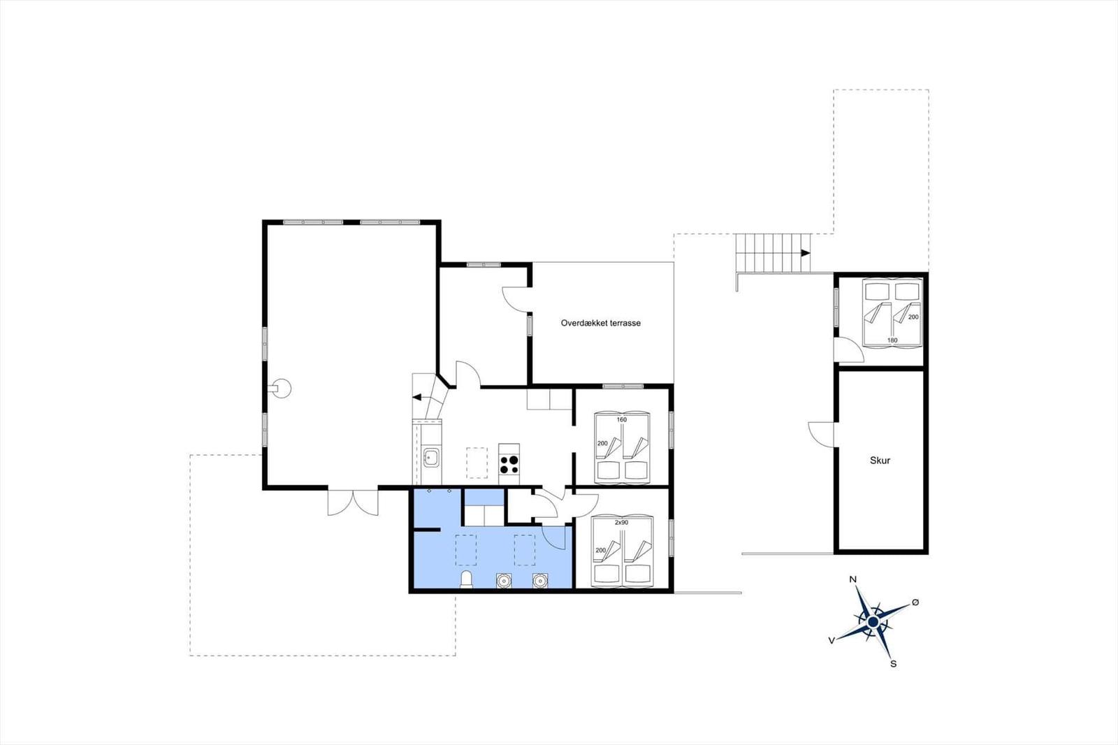 Funktionaler Grundriss mit Küche, Schlafzimmer und überdachter Terrasse.