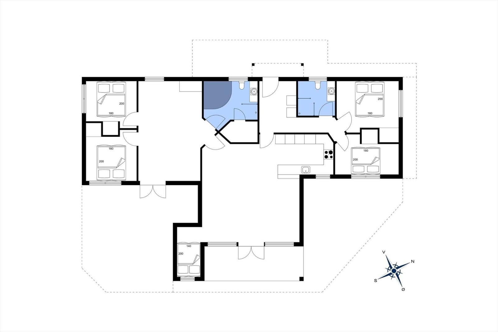 Functional floor plan with multiple bedrooms and kitchen. Orientation with compass.