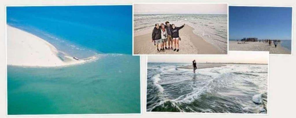 Strand mit klarem Wasser und Sand, Menschen genießen die Küstenlandschaft.