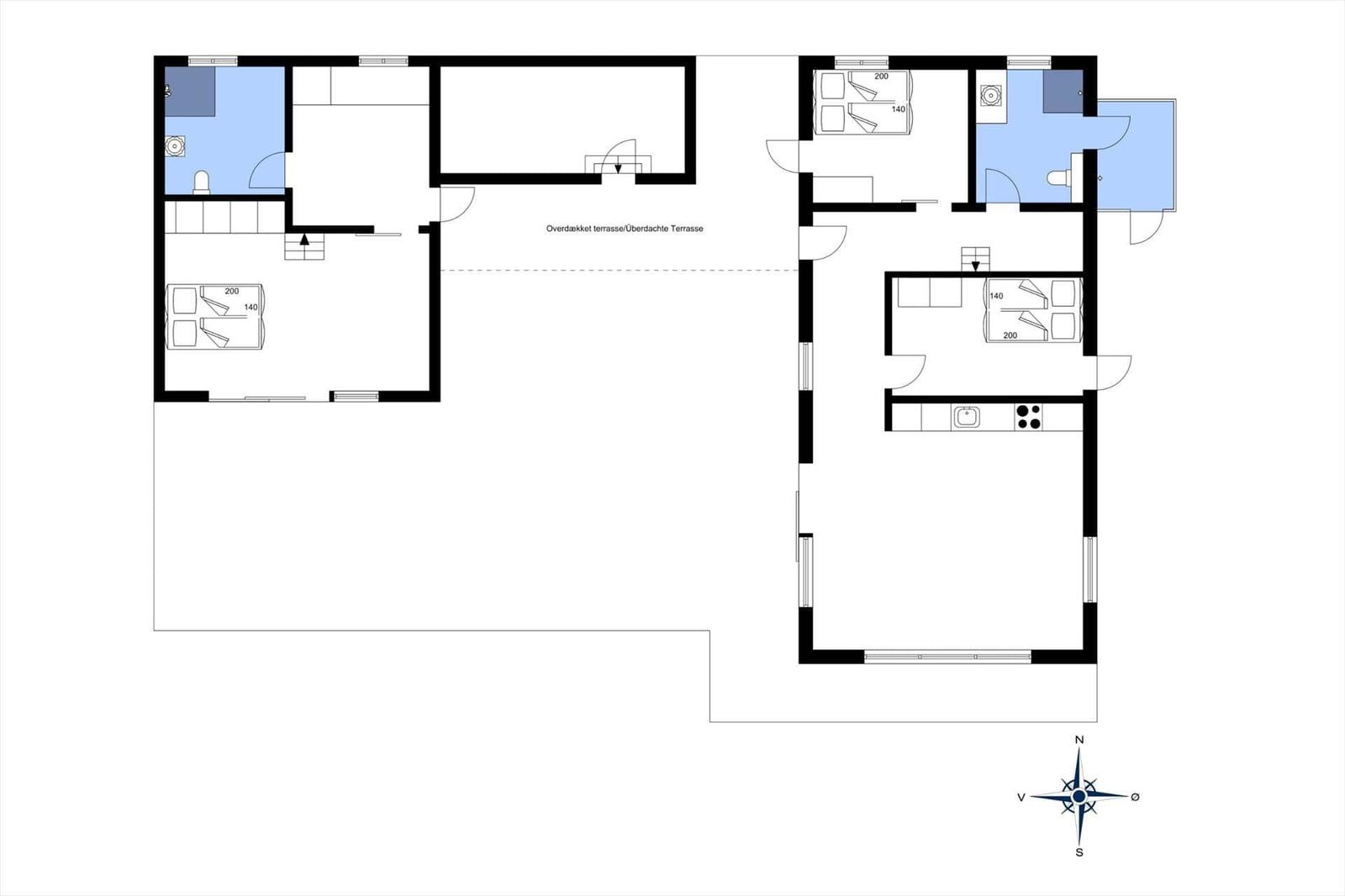 Funktionaler Grundriss mit Küche, Schlafzimmer und überdachter Terrasse.