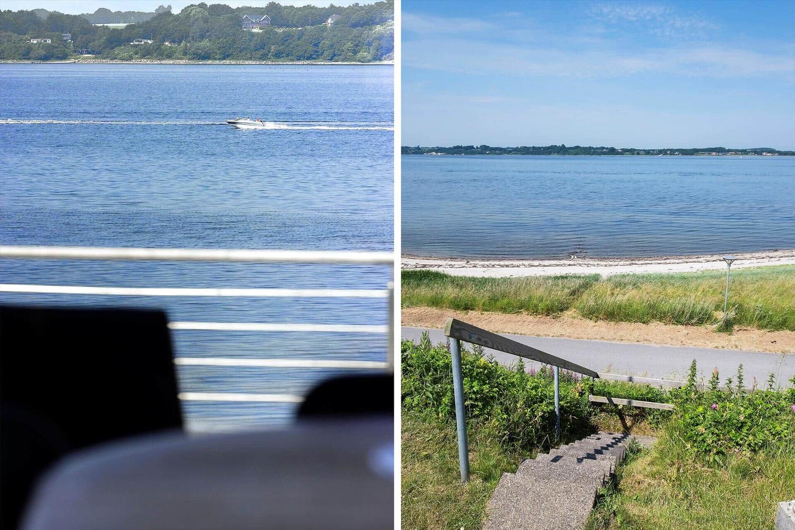 Blick auf ruhiges Wasser mit Boot und Strand. Steigungsstufen führen zum Ufer.