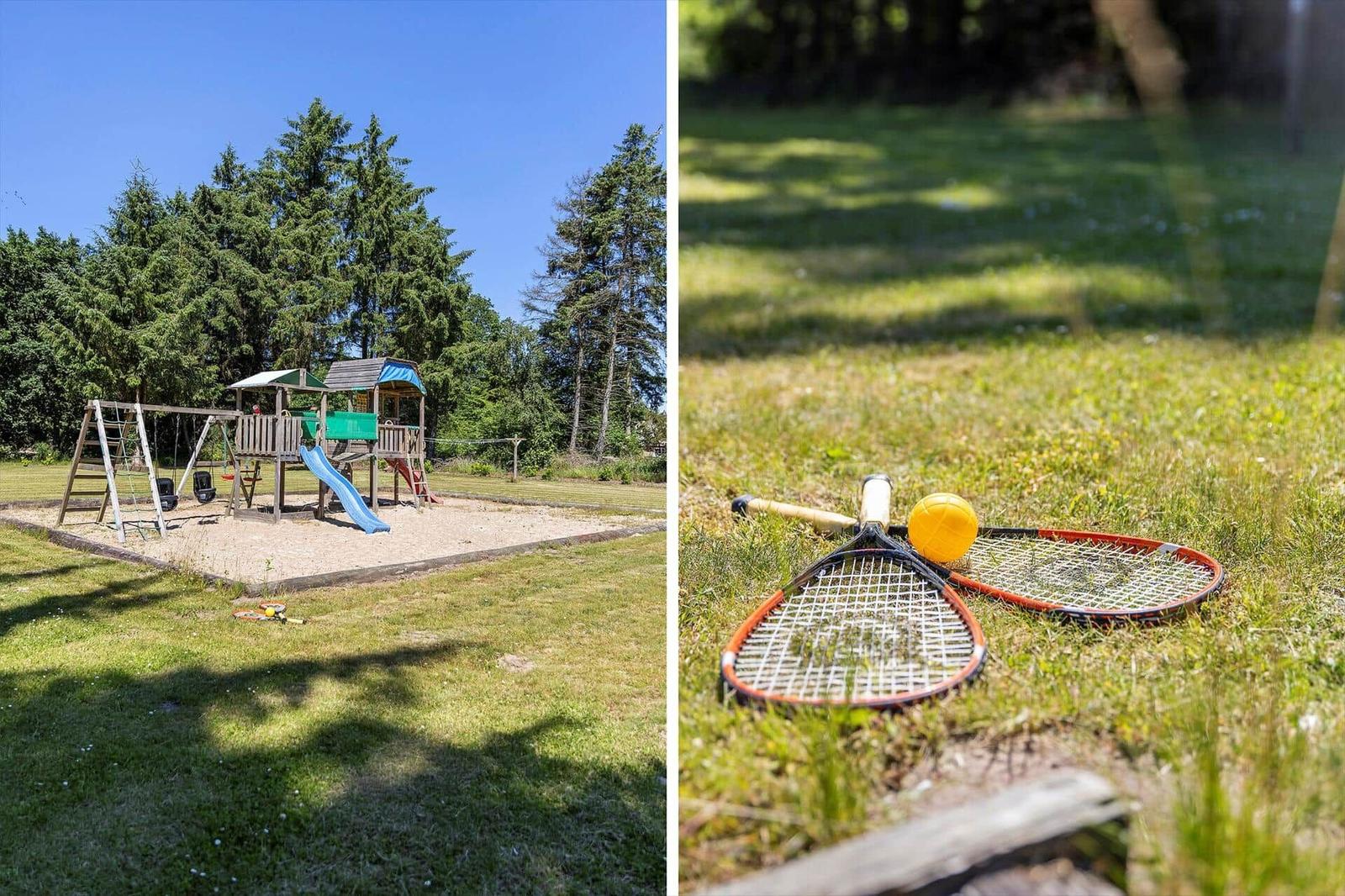 Hinterhof mit Spielplatz und Tennisschläger auf Rasen
