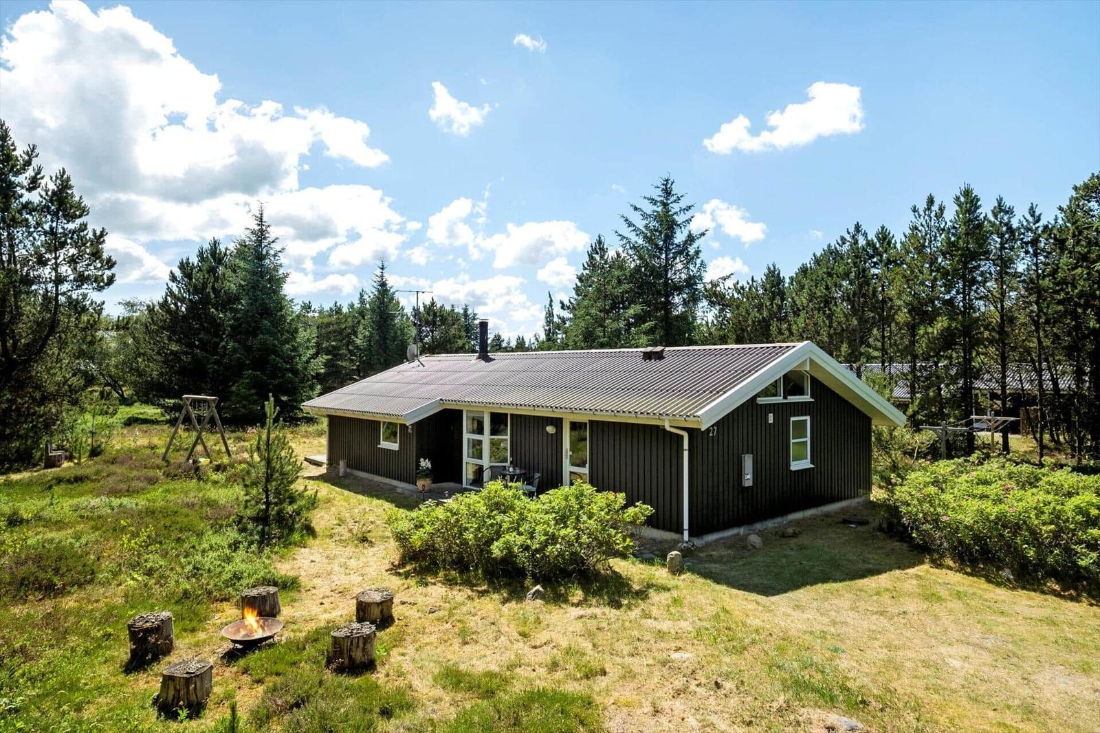 Holzhaus mit Grillplatz und Garten in Waldnähe