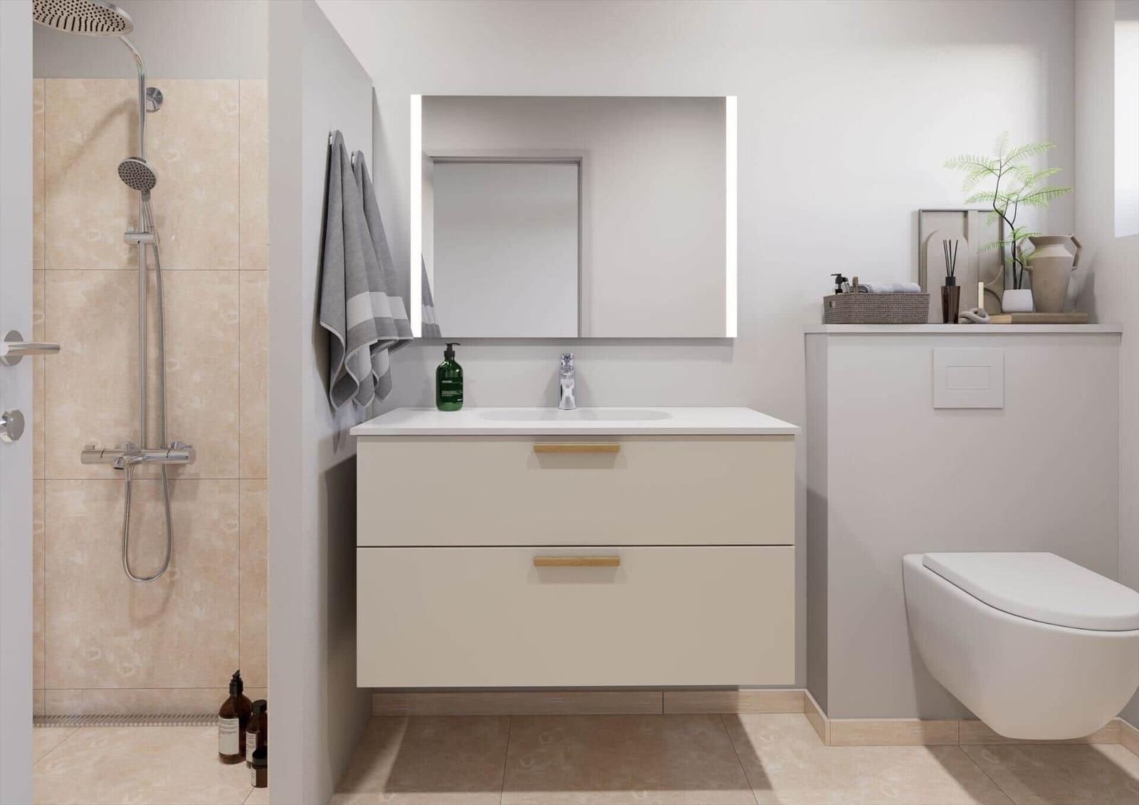 Badezimmer mit Dusche, Waschtisch und Toilette.