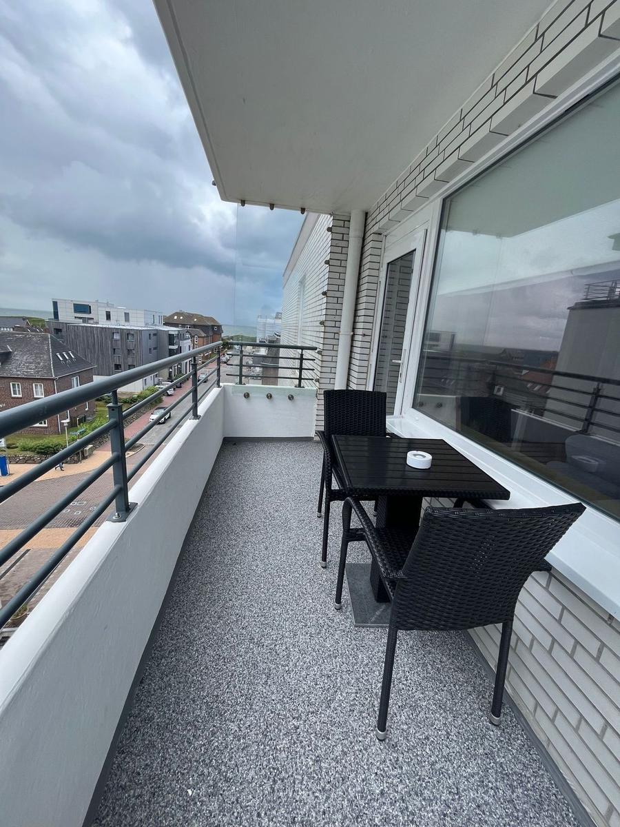 Balcony with Table and Chairs