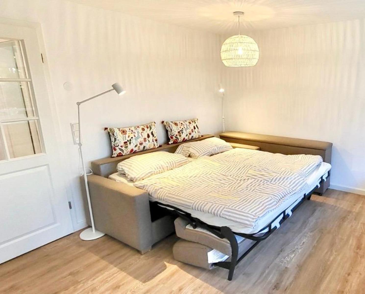 Wohnzimmer mit Schlafcouch