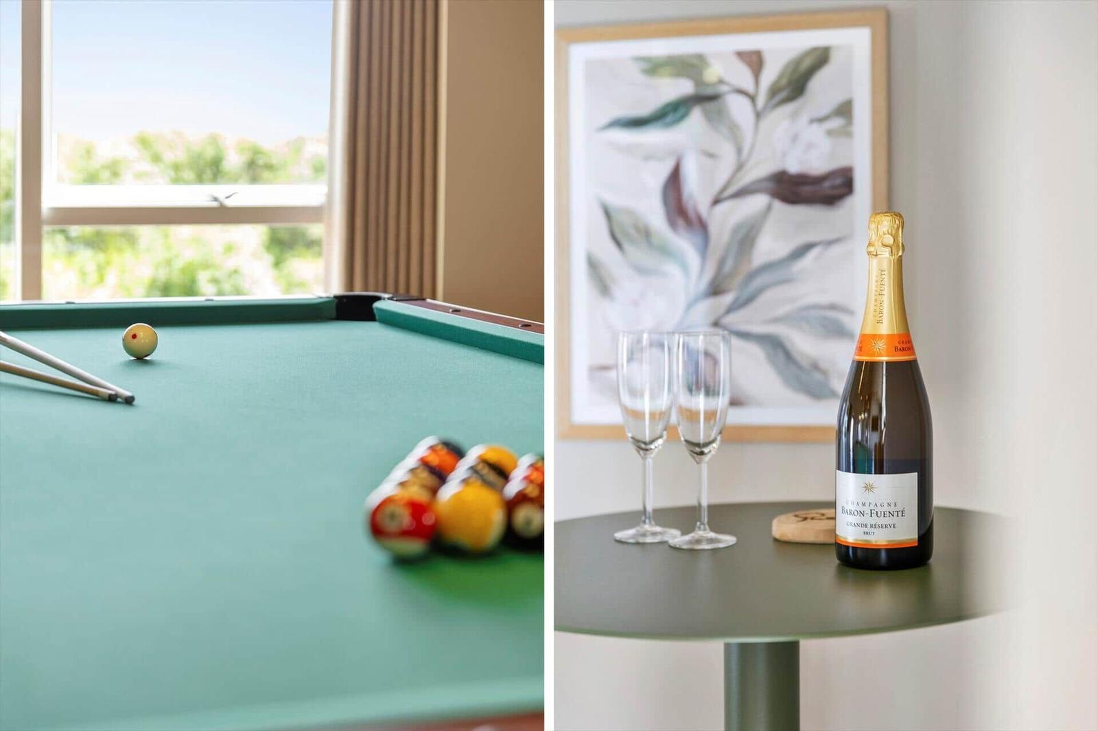Billardtisch mit Bällen und Fensterblick. Champagnerflasche mit Gläsern auf Tisch.