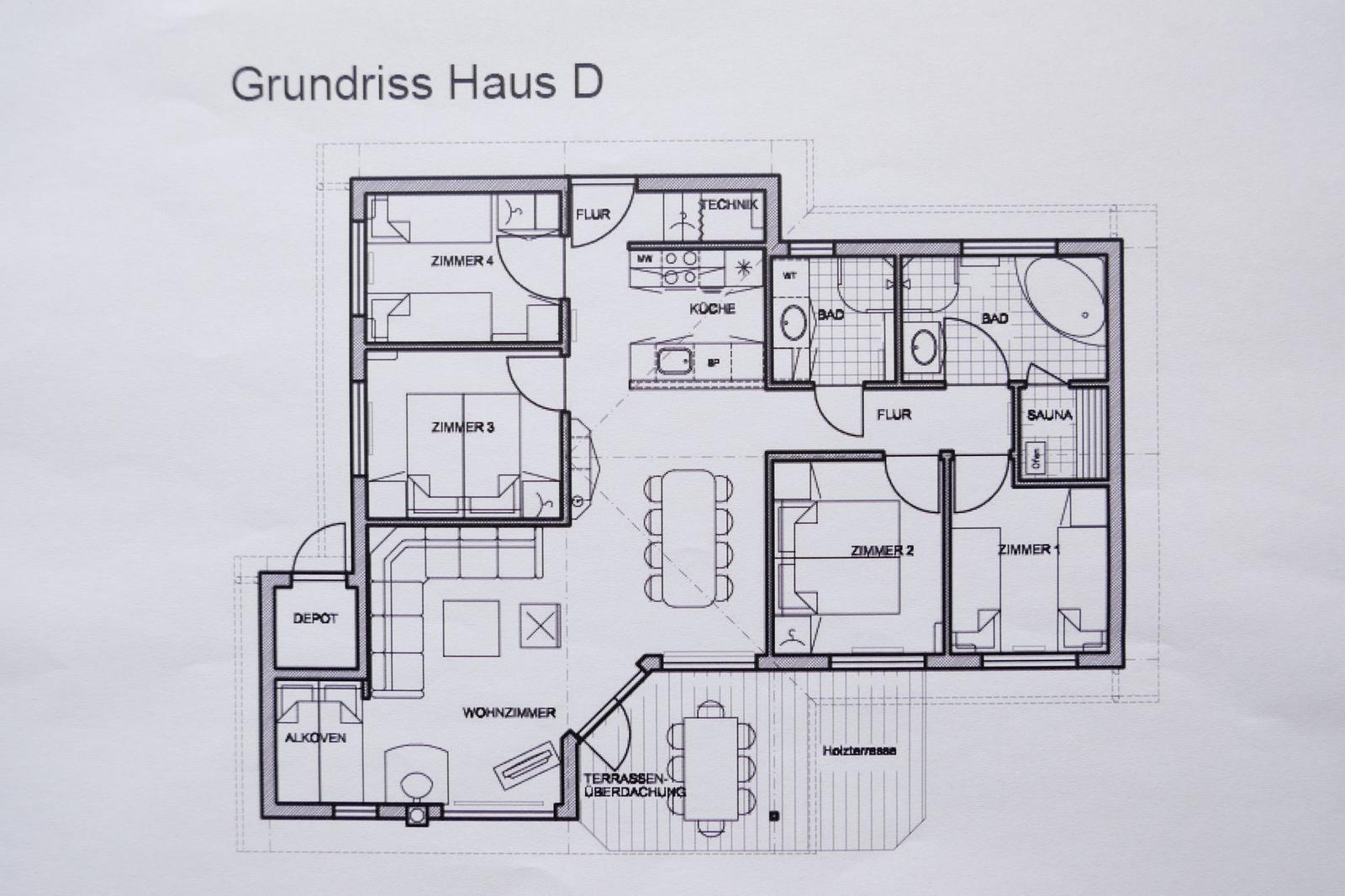 Grundriss von Haus D mit vier Schlafzimmern, Küche, Bad und Sauna.
