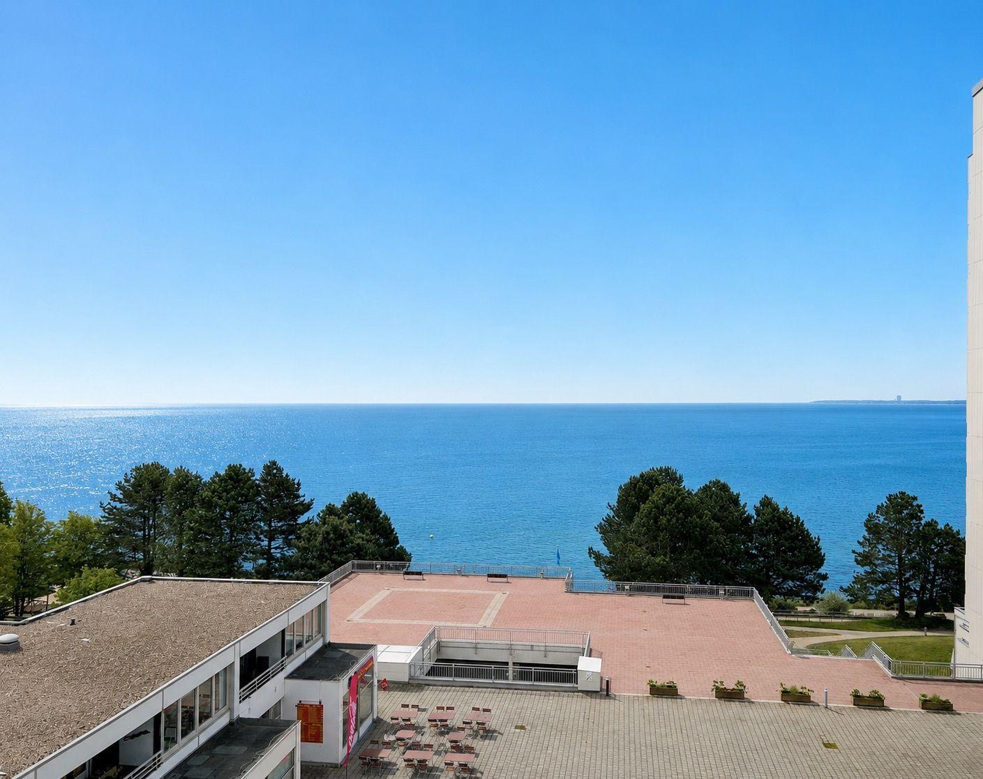 Terrace with view of the sea and trees