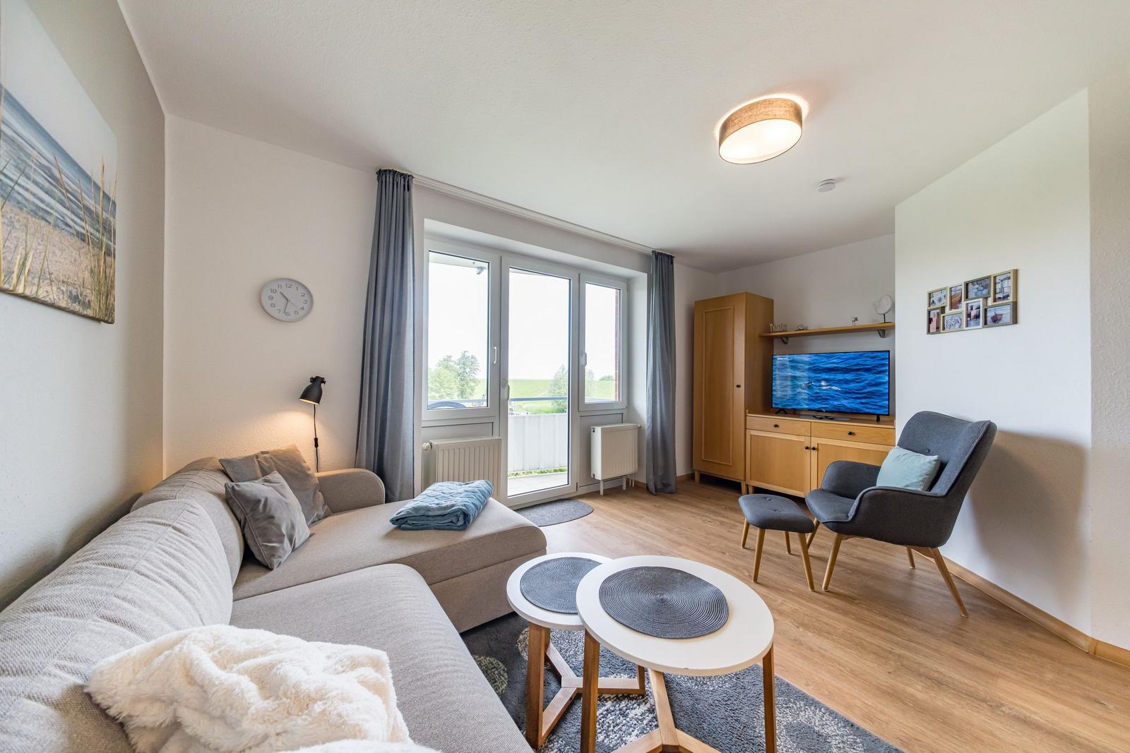 Wohn-Essbereich mit Sitzgelegenheit im sihi220, Hus Inselkieker, Mellumweg 6b in Schillig