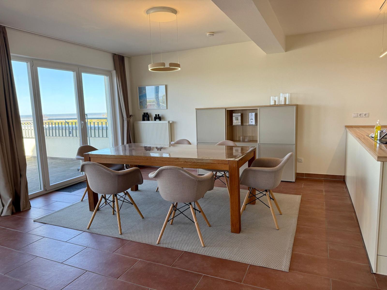 Wohn-Essbereich mit Esstisch im Mellumweg 1, NordseeResort Friesland, sinf51-4-N in Schillig