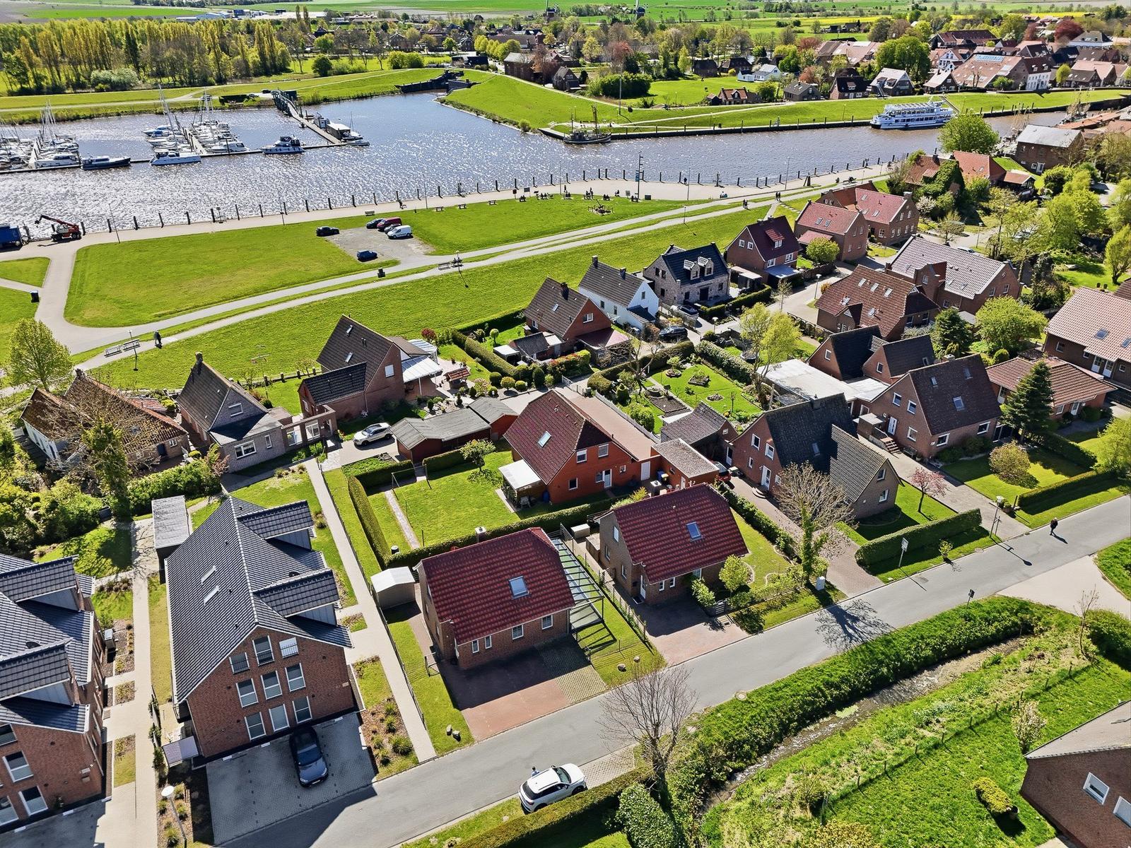 View of residential area with river and marina