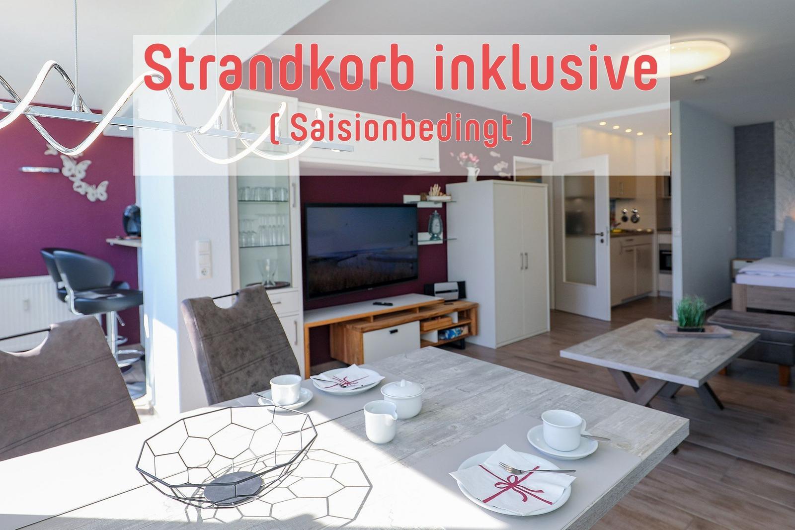 Wohnung mit Essbereich, TV und Schlafzimmer. Strandkorb inklusive, saisonbedingt.
