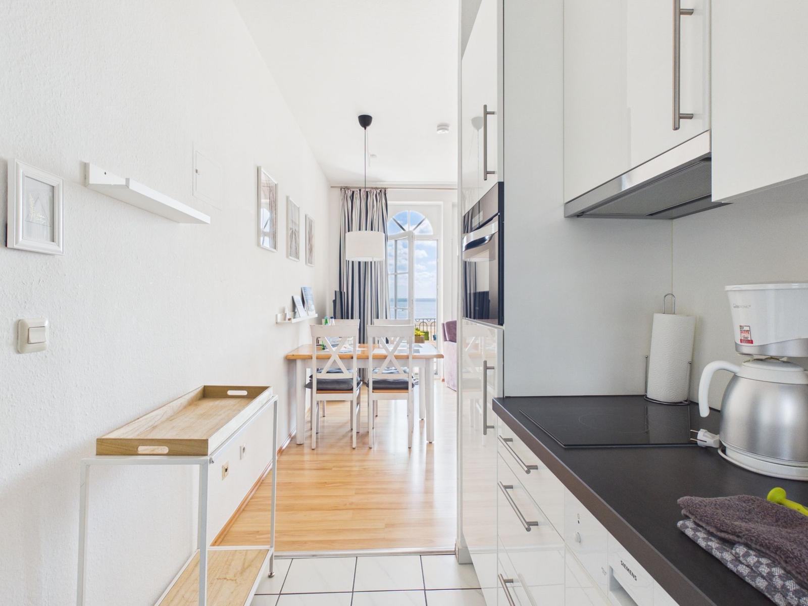 Kitchen with dining area and sea view