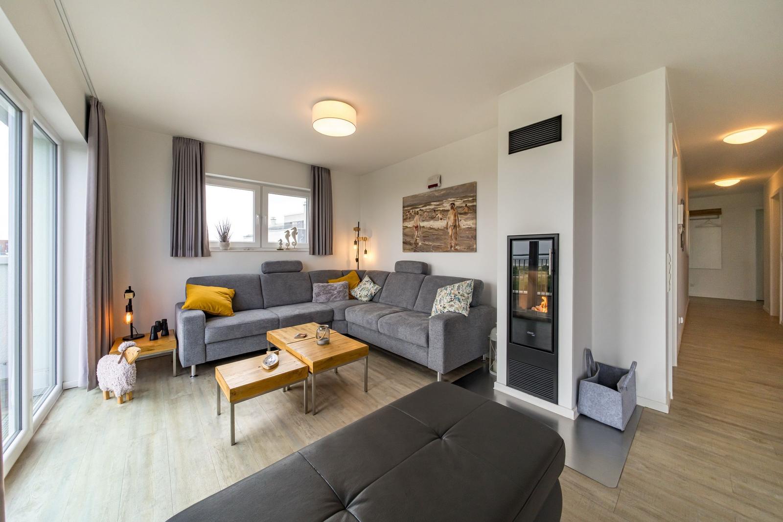 Wohn-Essbereich mit Couch im sinf48-6-N, Nordsee-Resort Friesland, Mellumweg 1 in Schillig