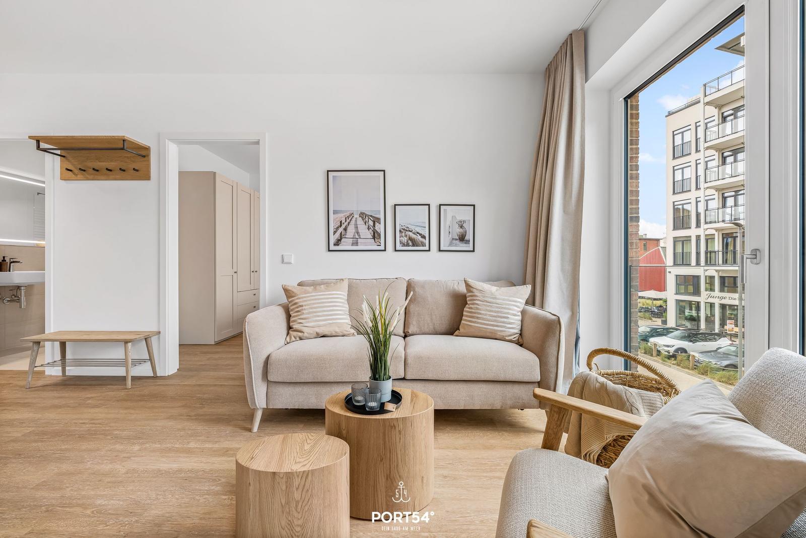 Living room with sofa, table, and street view