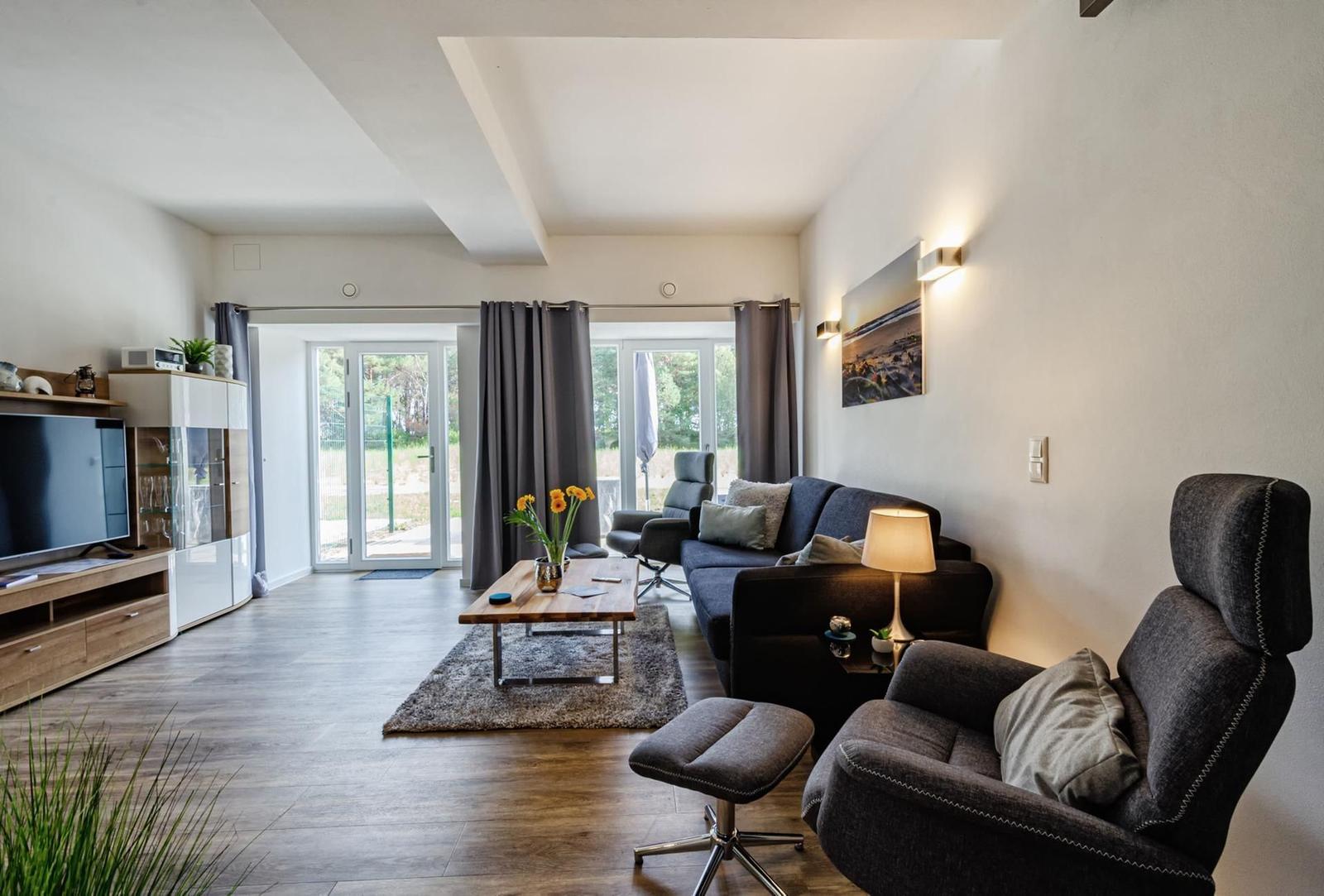 Wohn/Essbereich: Schlafsofa für 2 Personen, TV, Zugang zum Terrasse